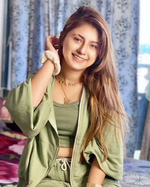 Arishfa Khan — Arishfa Khan — green and glowing.
